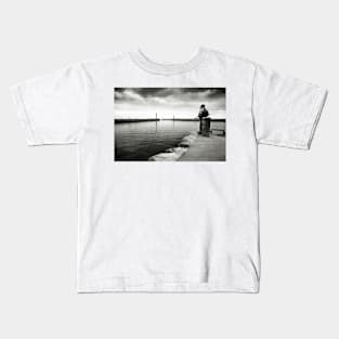 A boy fishing in the harbour at Whitby - Yorkshire, UK Kids T-Shirt